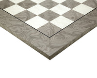 Close-up of 19.7 Inch Gloss Lacquered Ash Burl Deluxe Chess Board corner showing Grey Ash Burl and Maple veneer.